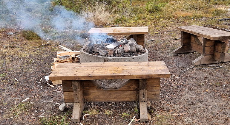A fireplace made of concrete.