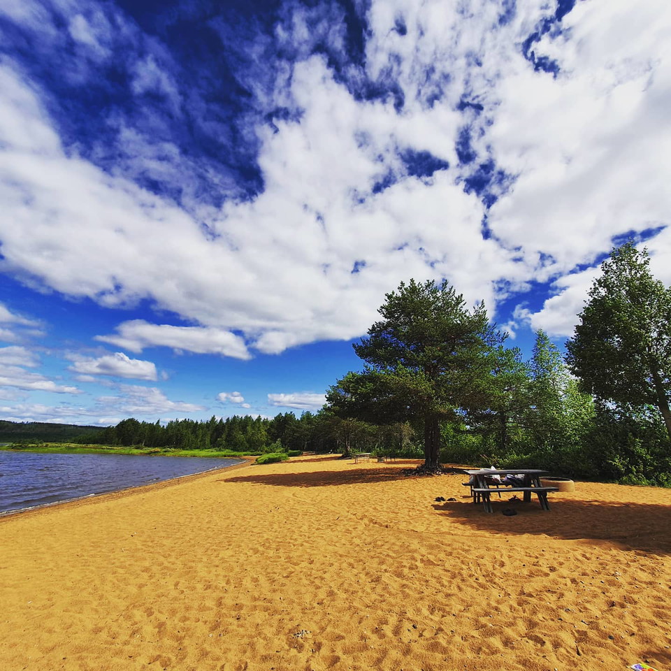 Beautiful beach with sand and benches
