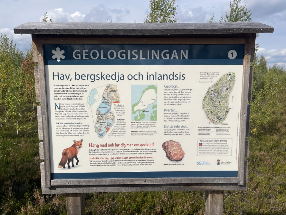 Informationsskylt vid stig, om geologi.