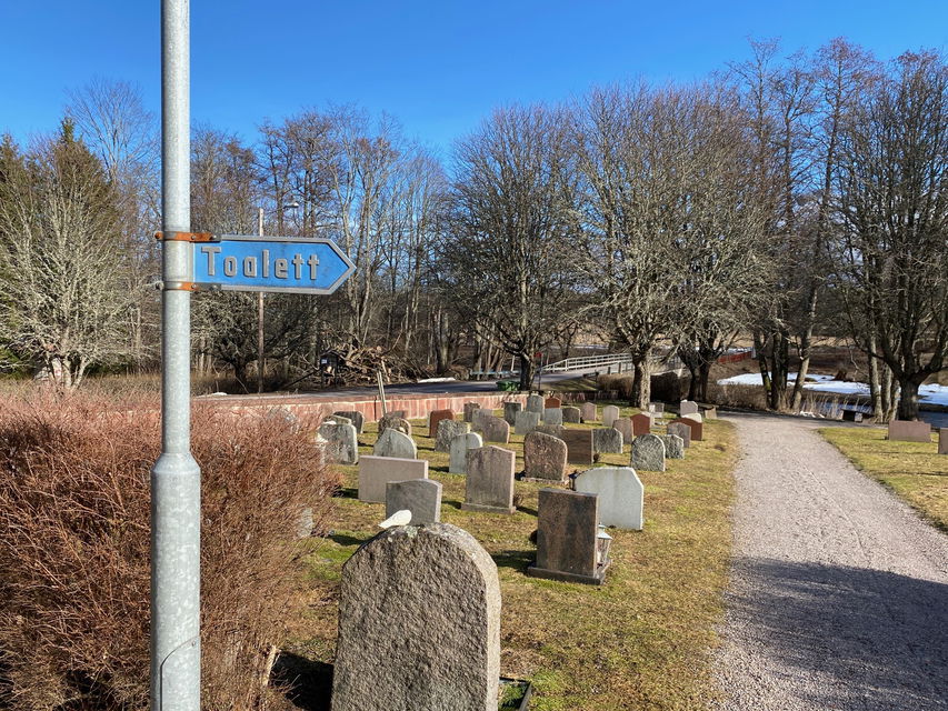 Skylt till toalett