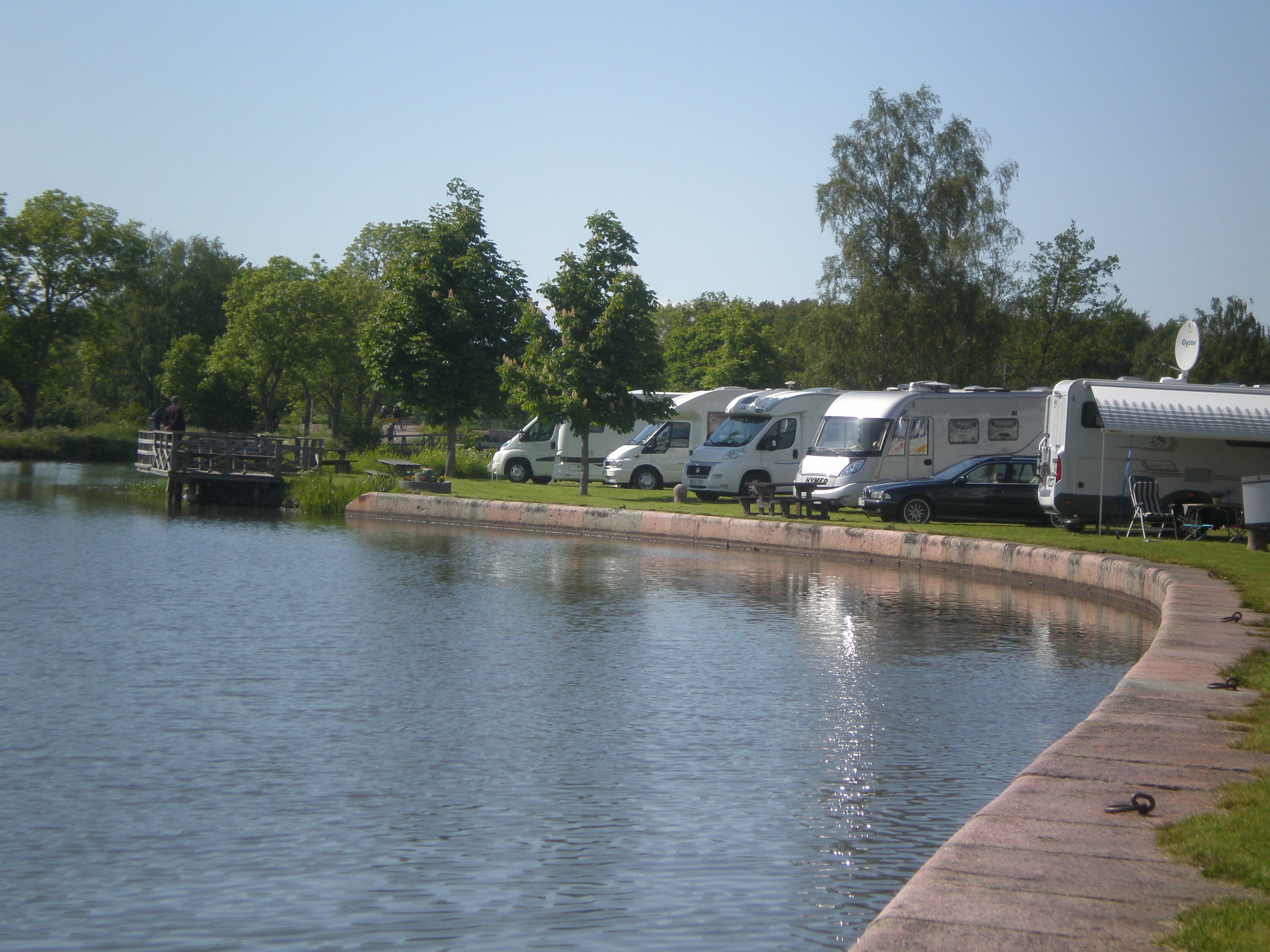 Camper pitches in Lyrestad by Göta Canal