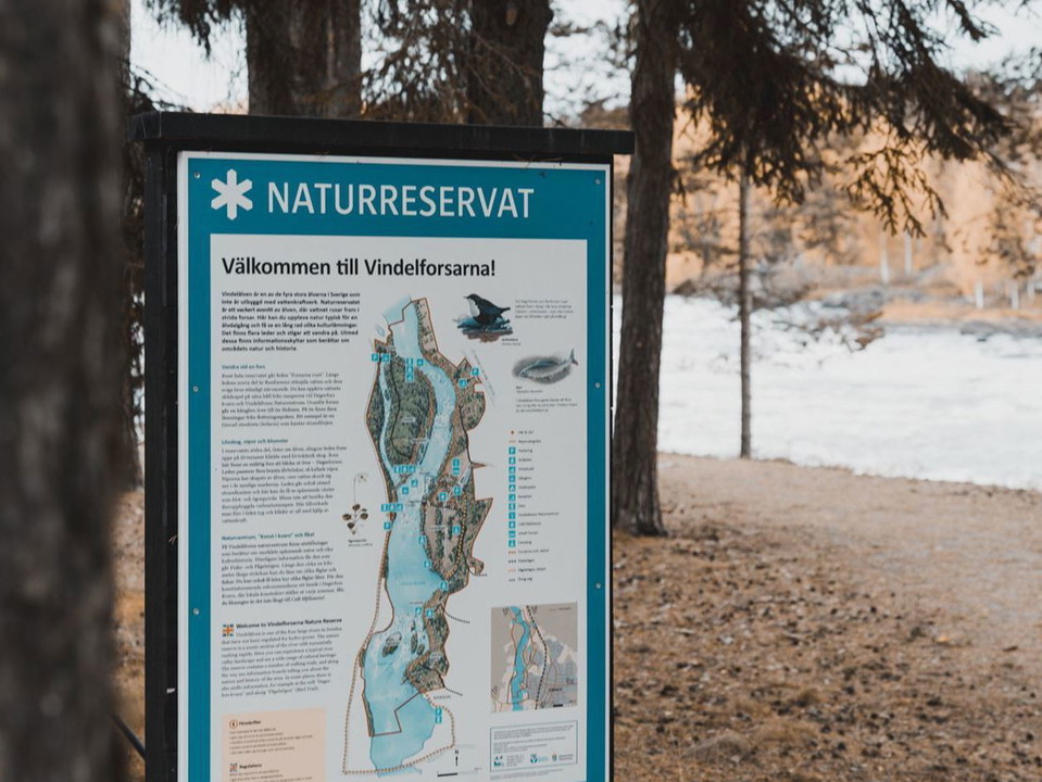 skylt över naturreservatet Vindelforsarna